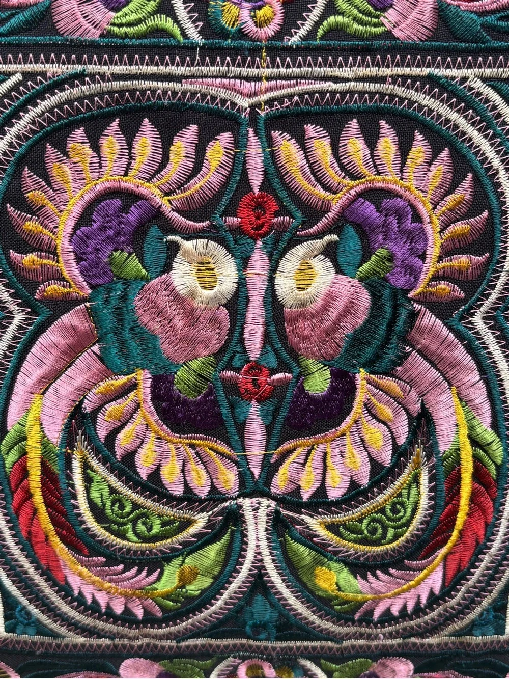 Beautiful, colorful, embroidered accent pillow